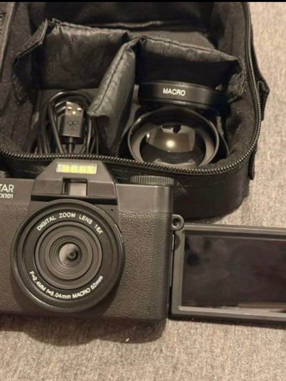 Black Digital Camera with Detachable Macro Lens and Flip LCD
